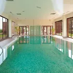 Bright Indoor And Outdoor Pool And Sauna