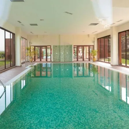 Bright Indoor And Outdoor Pool And Sauna
